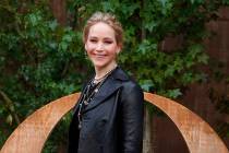 Actress Jennifer Lawrence smiles during a photocall before Dior's Ready To Wear Spring-Summer 2 ...
