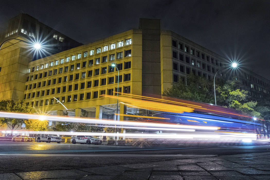 In a Nov. 1, 2017, file photo, traffic along Pennsylvania Avenue in Washington streaks past the ...