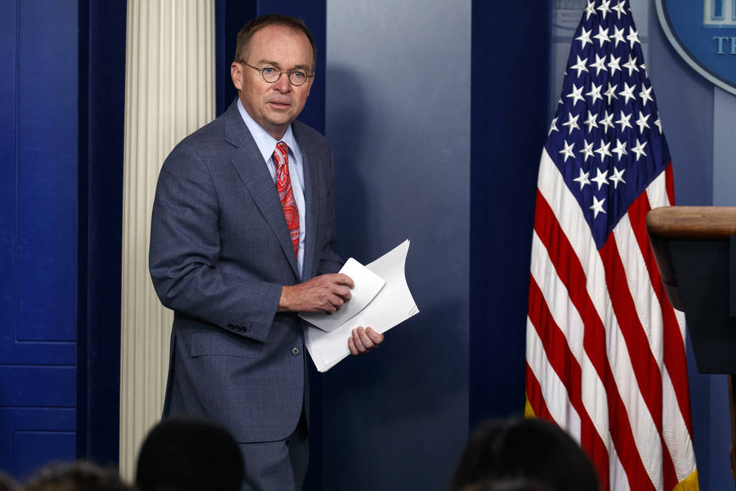 FILE - In this Thursday, Oct. 17, 2019, file photo, White House chief of staff Mick Mulvaney ar ...