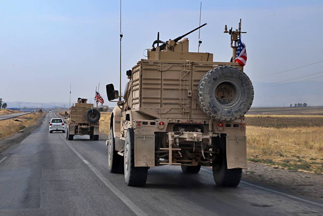 A U.S. military convoy arrives near Dahuk, Iraqi, Monday, Oct. 21, 2019. Defense Secretary Mark ...