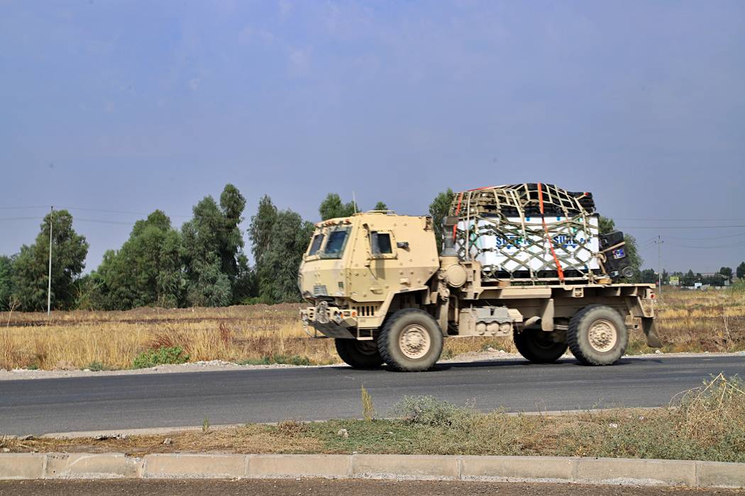 A U.S. military vehicle, part of a convoy, arrives near Dahuk, Iraqi, Monday, Oct. 21, 2019. De ...