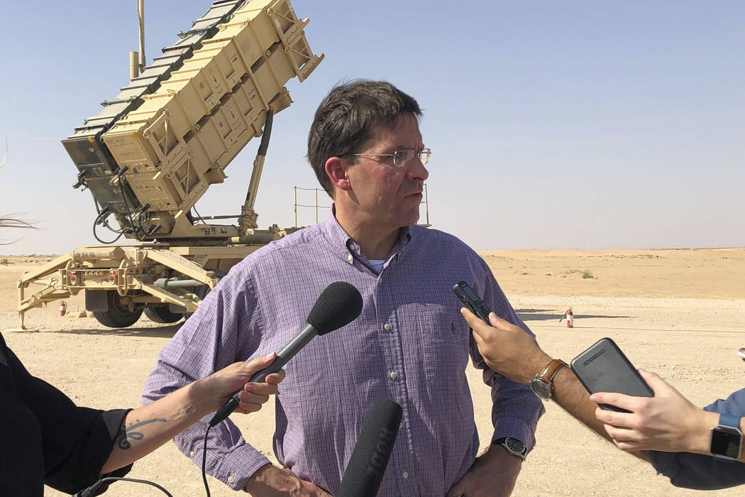 Defense Secretary Mark Esper talks to reporters at Prince Sultan Air Base in Saudi Arabia, Tues ...