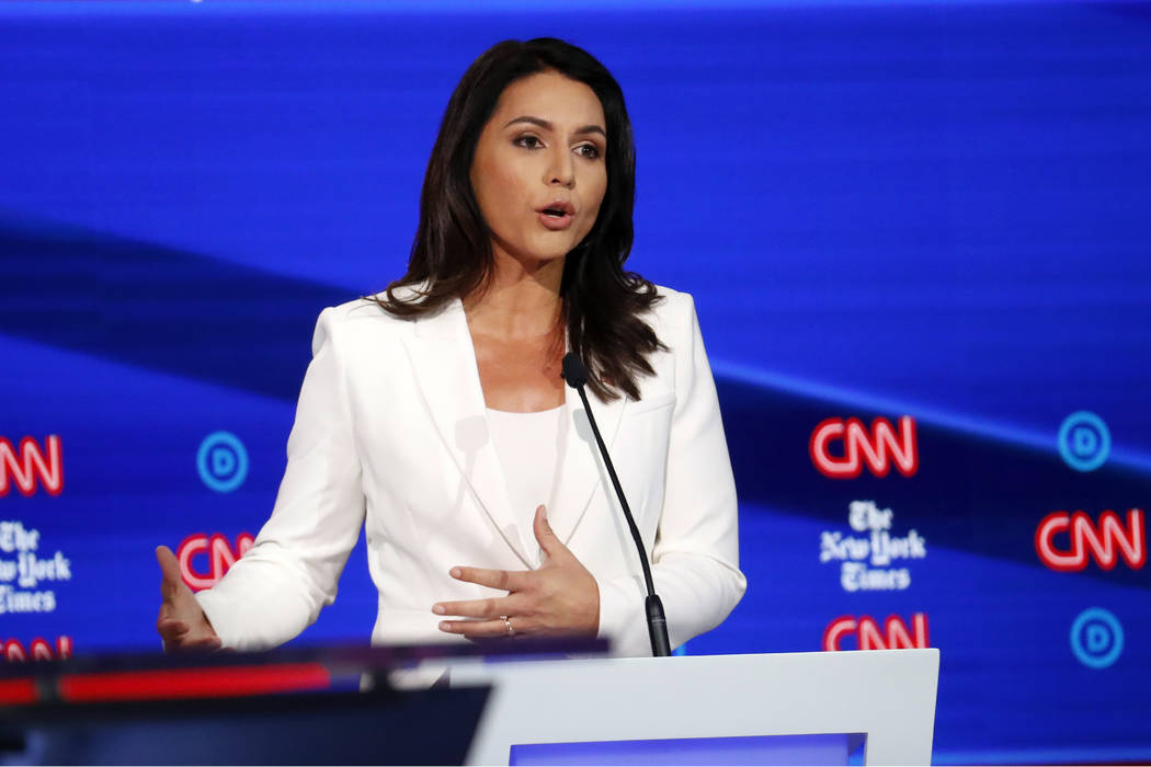 Democratic presidential candidate Rep. Tulsi Gabbard, D-Hawaii, participates in a Democratic pr ...