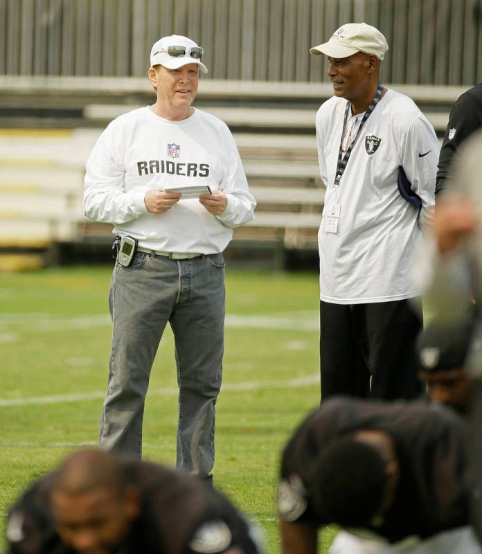 Oakland Raiders owner Mark Davis, left, and Hall of Fame cornerback Willie Brown, right, during ...