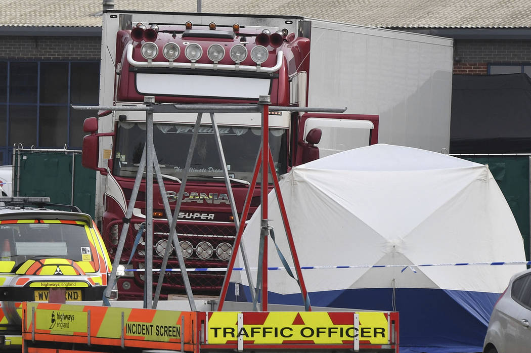 View of a truck, seen in rear, that was found to contain a large number of dead bodies, in Thur ...