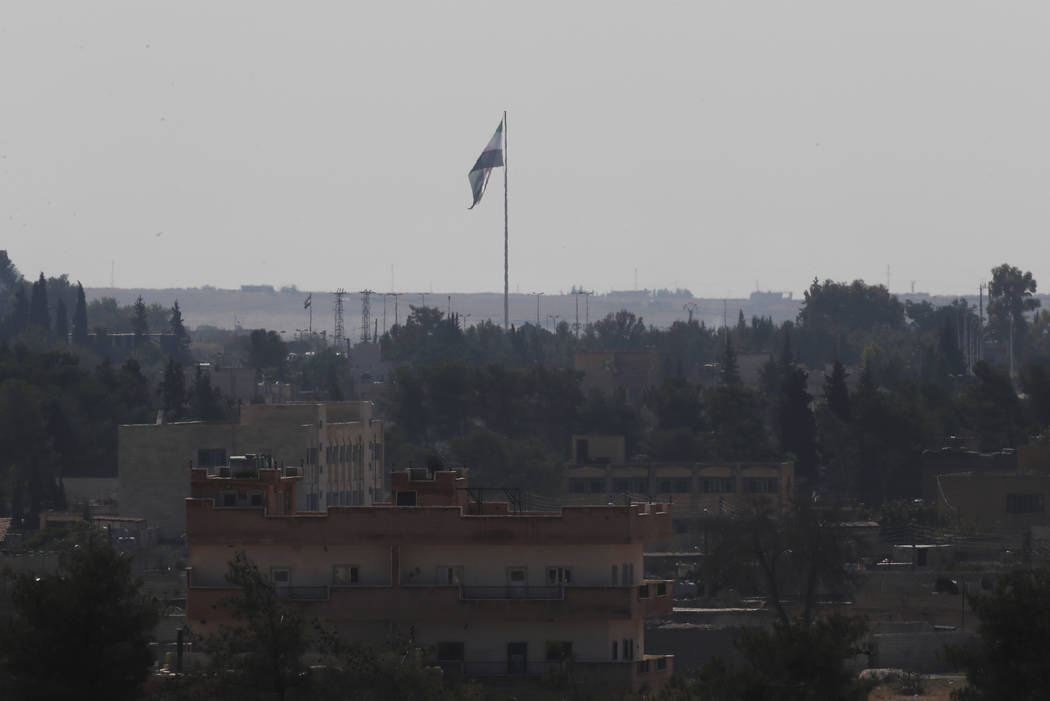 In this photo taken from the Turkish side of the border between Turkey and Syria, in Akcakale, ...