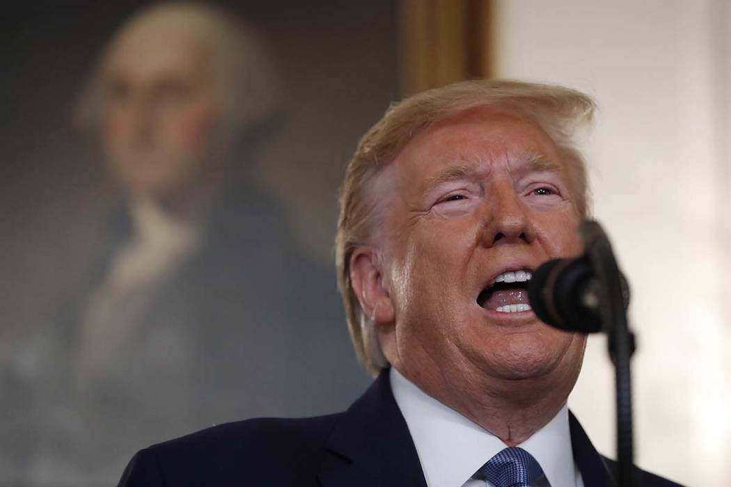 President Donald Trump speaks, Wednesday, Oct. 23, 2019, in the Diplomatic Room of the White Ho ...