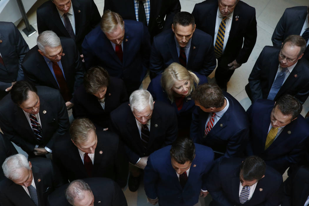 Rep. Debbie Lesko, R-Ariz., center, gathers with fellow House Republicans for a news conference ...