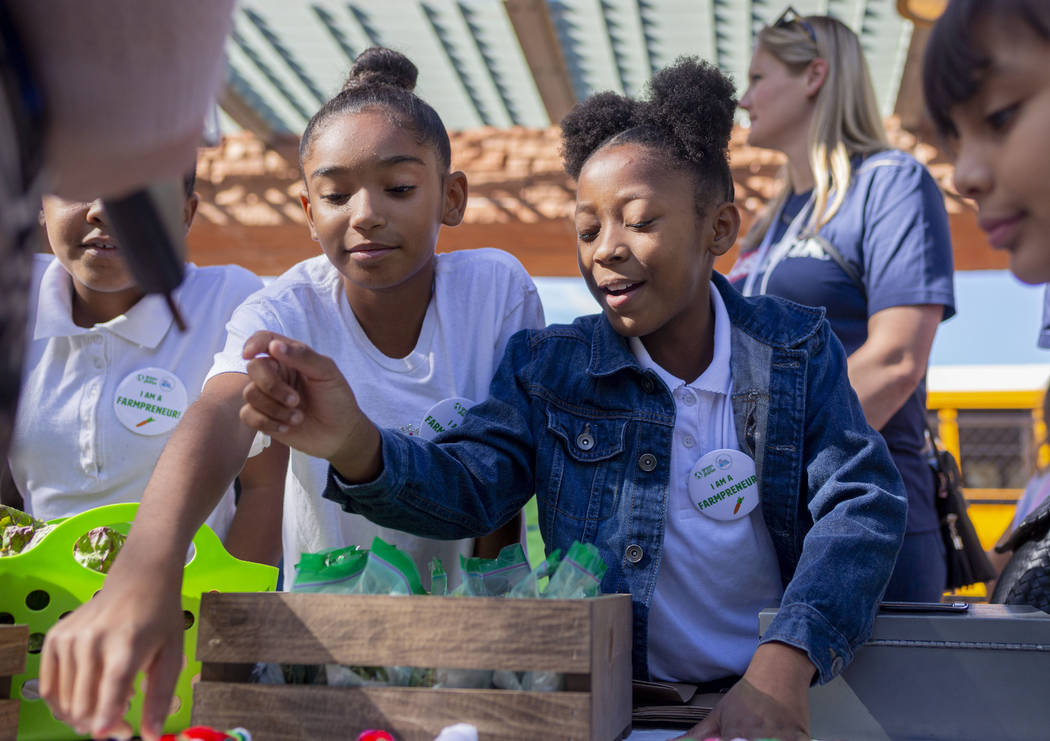 Robert L. Taylor Elementary School students Annaliyah Bowden, 10, left, and Alayjah Zeamer, 10, ...