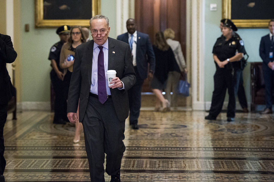 Senate Minority Leader Sen. Chuck Schumer of N.Y., walks to the Senate Chamber on Capitol Hill ...