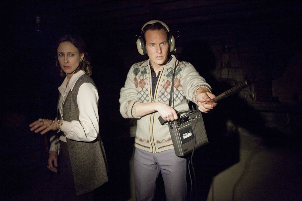 Vera Farmiga and Patrick Wilson portray Lorraine and Ed Warren in "The Conjuring." (Warner Bros ...