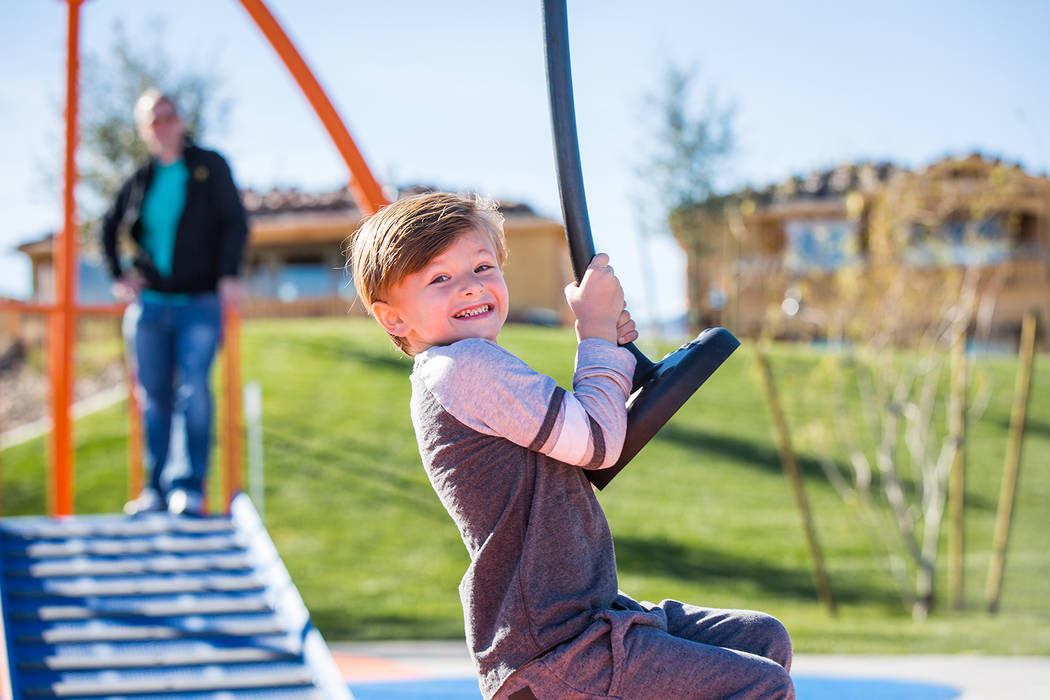 Alexander Hostalek, 7, spends time on the adventure-themed apparatus at Fox Hill Park. (Summerlin)