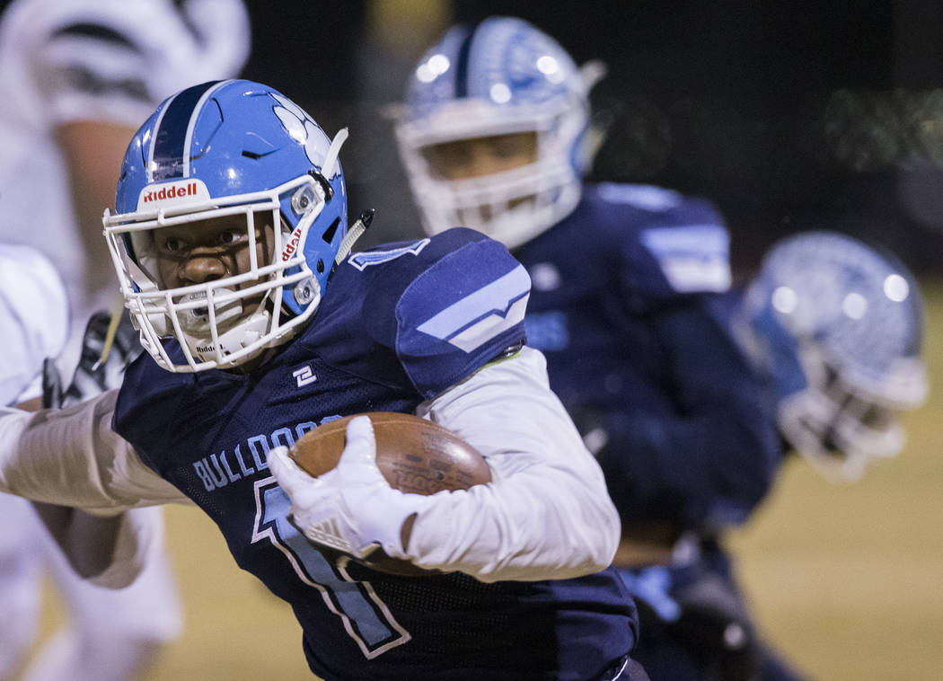 Centennial senior Jordan Smith (1) sprints down the sideline in the first quarter during the Bu ...