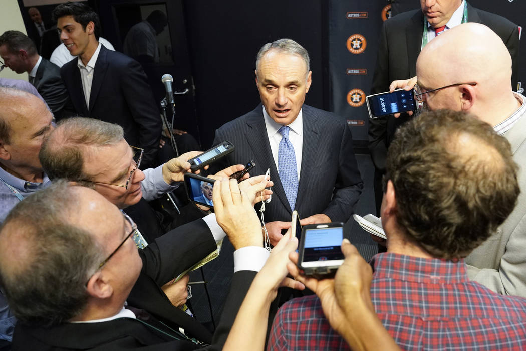 MLB commissioner Robert D. Manfred Jr. talks to the media before Game 2 of the baseball World S ...