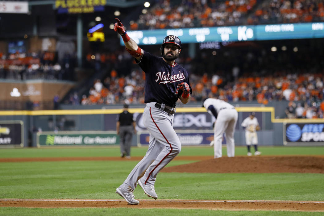 Washington Nationals' Adam Eaton celebrates after a home run off Houston Astros relief pitcher ...