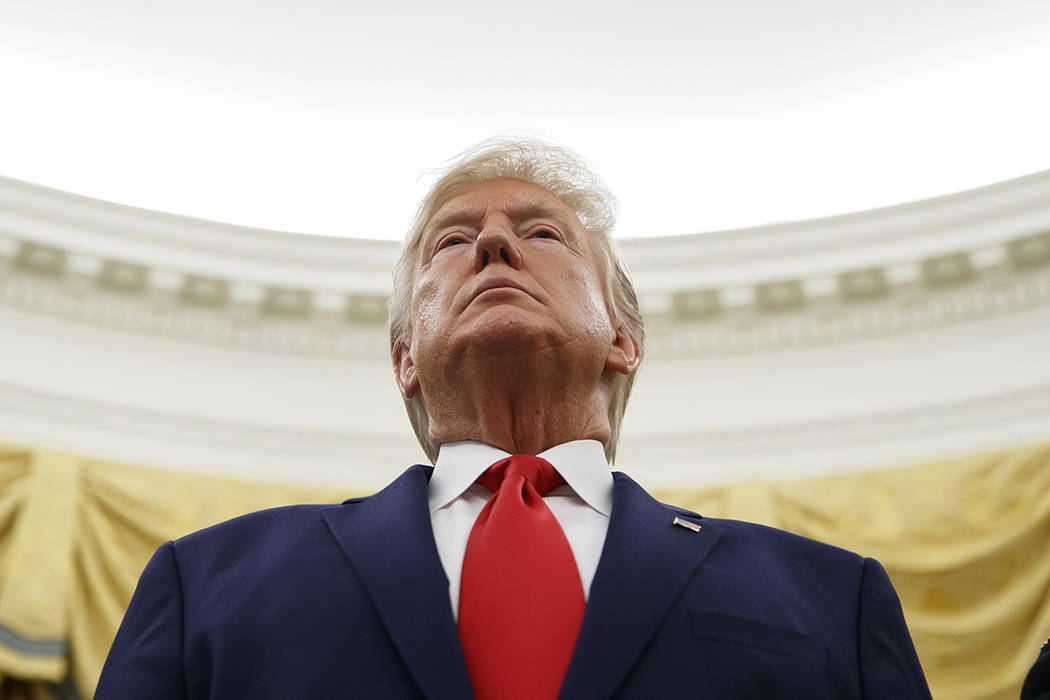 President Donald Trump stands during a Presidential Medal of Freedom ceremony for auto racing g ...