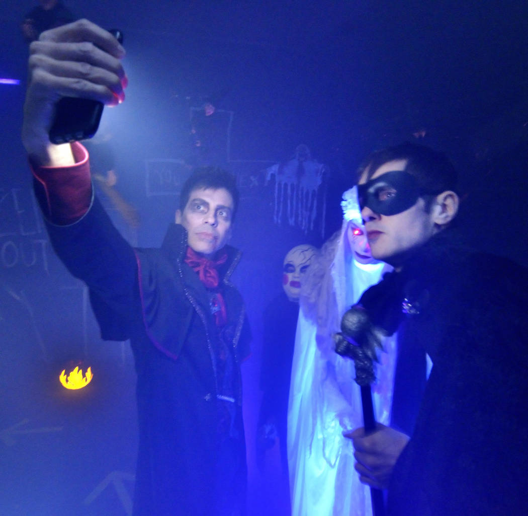 Rick DiCarlo, left, and Jeff Damon take a selfie in the haunted house at a Red Rock Country Clu ...
