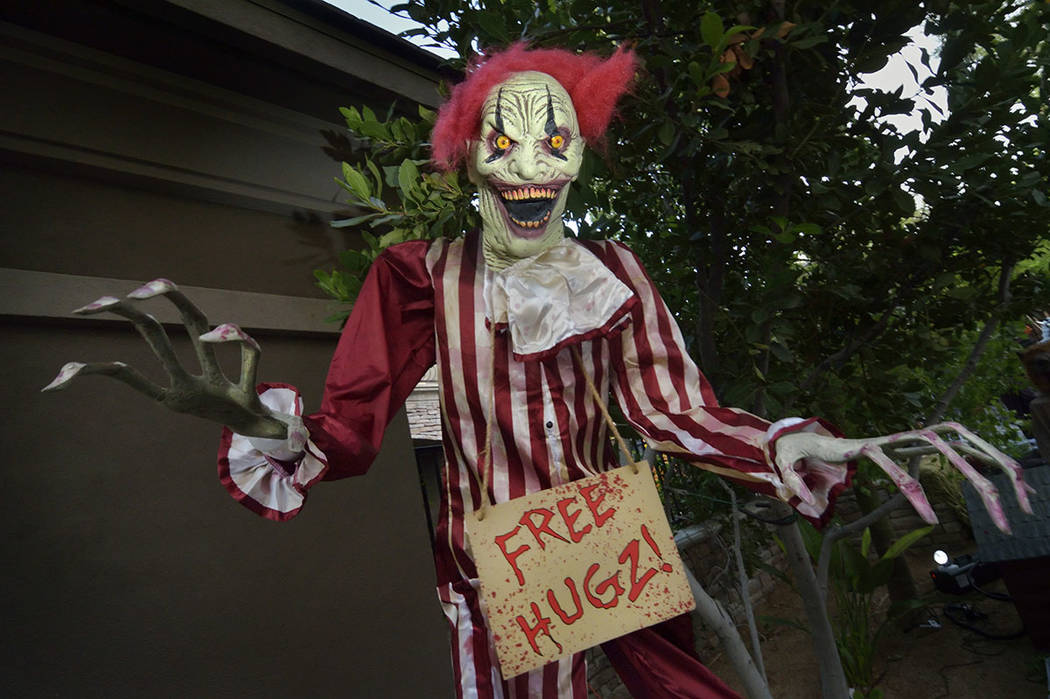 A scary clown is ready to greet Halloween guests. (Bill Hughes Real Estate Millions)