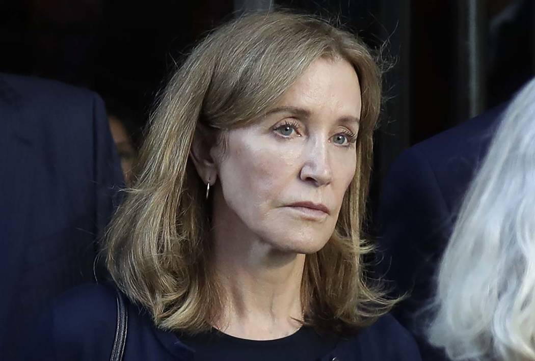 A Sept. 13, 2019, file photo shows actress Felicity Huffman leaving federal court after her sen ...