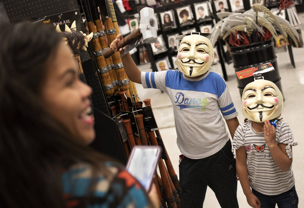 Armynne Leidzen takes photos of her daughters Bianca Leidzen, 9, left, and Kenzie Leidzen, 4, a ...