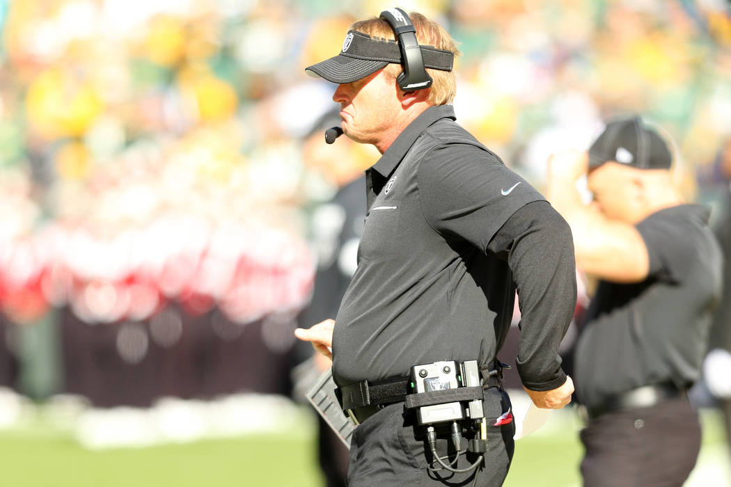 Oakland Raiders head coach Jon Gruden watches the game on the sideline during the first half of ...