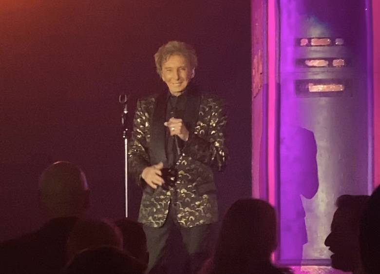 Barry Manilow performs in a surprise appearance during the "Evening to Save Lives," benefitting ...