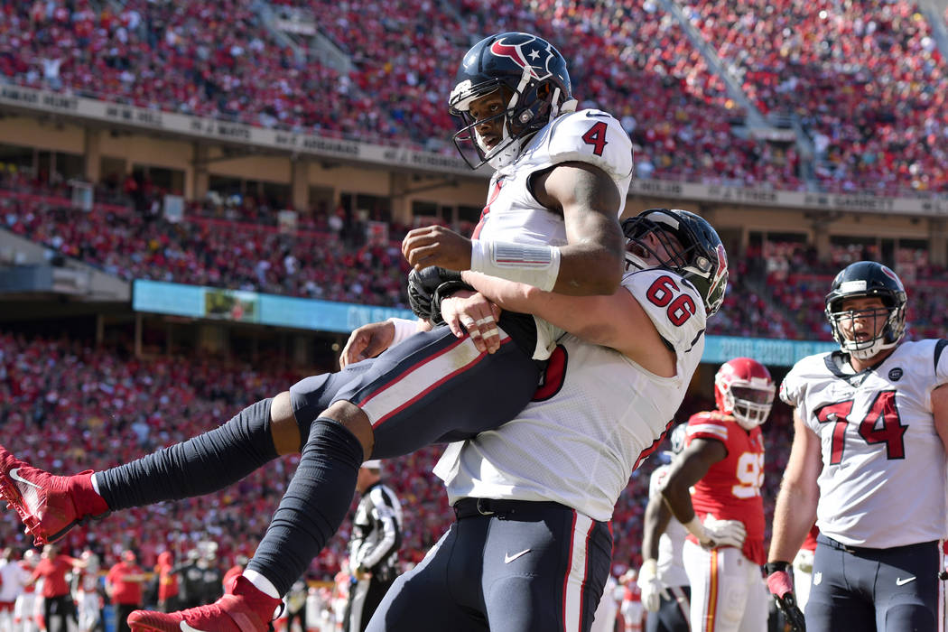 Houston Texans quarterback Deshaun Watson (4) celebrates his touchdown against the Kansas City ...