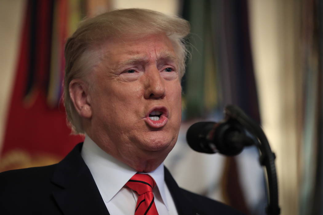 President Donald Trump speaks in the Diplomatic Room of the White House, Sunday, Oct. 27, 2019, ...