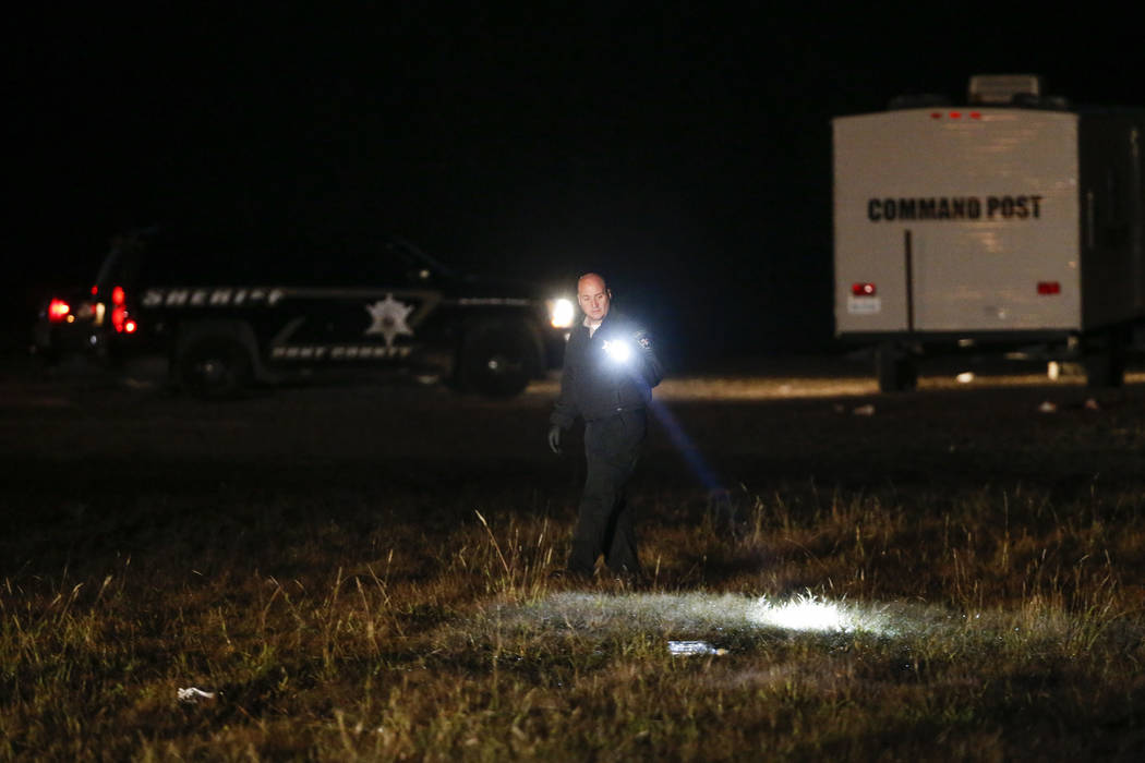 Authorities work the scene after a deadly shooting in Greenville, Texas, on Sunday, Oct. 27, 20 ...