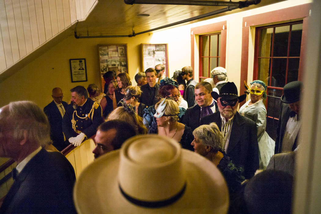 Attendees line up for the grand march during the Nevada Statehood Ball at Piper's Opera House i ...