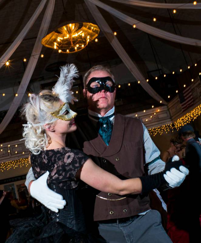 Taylor Hamby, left, and Jeff Sumners, both of Orange County, Calif., dance during the Nevada St ...