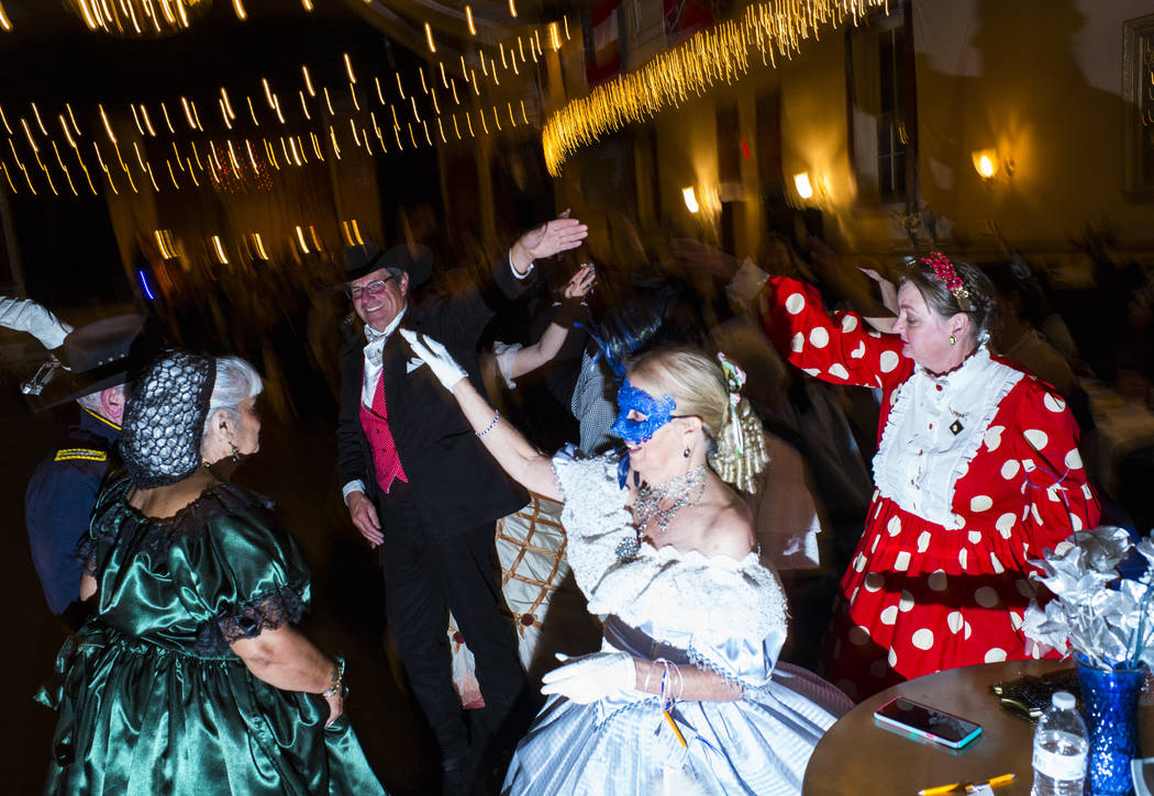 Attendees dance during the Nevada Statehood Ball in Virginia City on Saturday, Oct. 26, 2019. ( ...