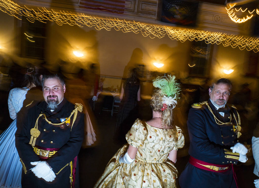 Attendees dance during the Nevada Statehood Ball in Virginia City on Saturday, Oct. 26, 2019. ( ...