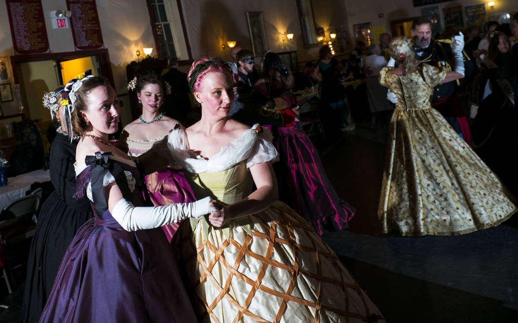 Lauren Stowell, of Reno, left, and Christina DeAngelo, of Sparks, dance during the Nevada State ...