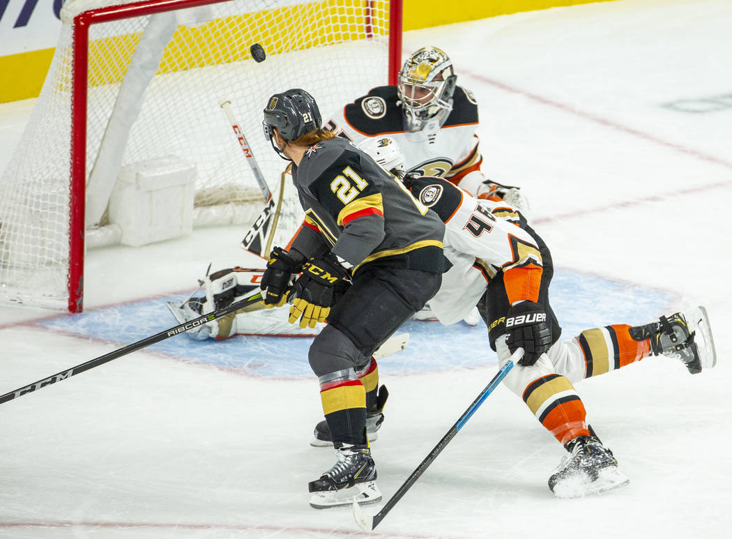 Vegas Golden Knights center Cody Eakin (21) sends a shot to the net but hits the post versus An ...