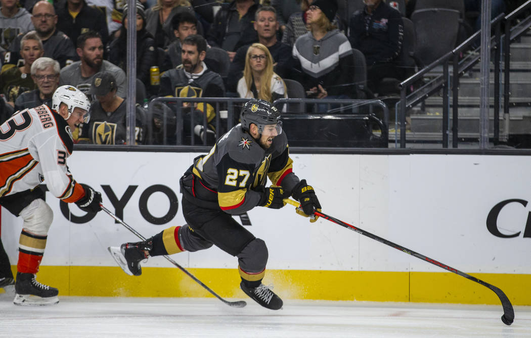 Anaheim Ducks right wing Jakob Silfverberg (33) trips up Vegas Golden Knights defenseman Shea T ...