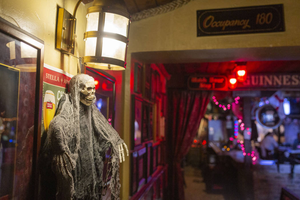 Halloween decor hangs in the allegedly "haunted" Crown & Anchor Pub in Las Vegas on Friday, Oct ...
