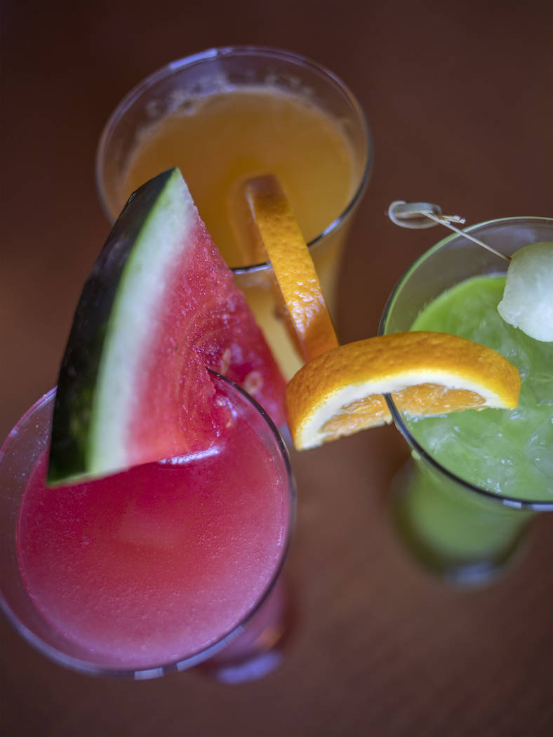 Mimosas made from fresh juices of watermelon, melon and orange at Rise & Shine in the Southern ...