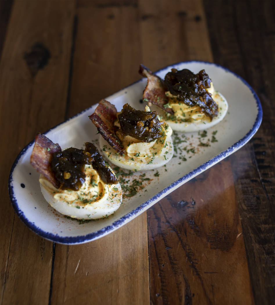 Wicked Deviled Eggs run 3 for $4.95 or 6 for $8.95 on the menu at Mama Bird in the Southern Hig ...