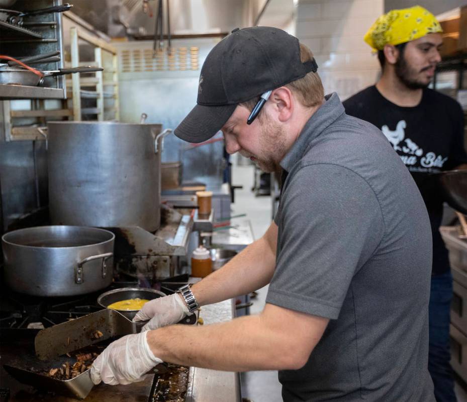 Zachary Substanley, general manager and pitmaster at Mama Bird, cooks a Pitmaster's Scramble on ...