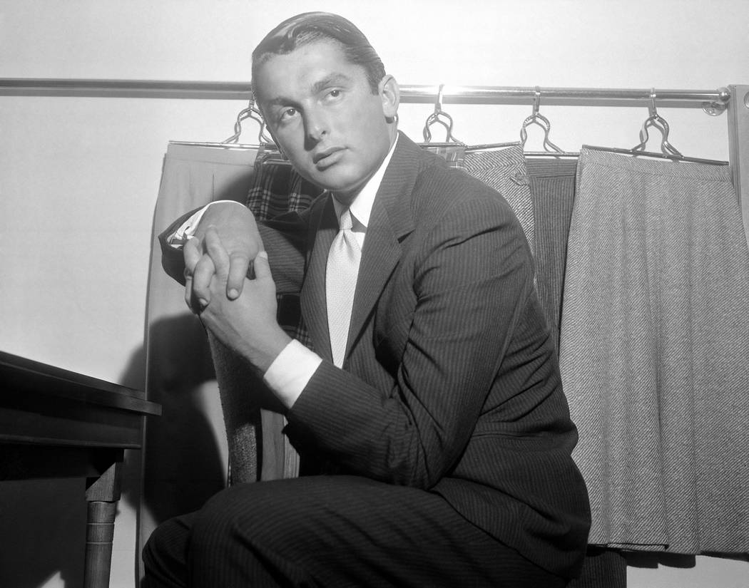 This July 31, 1957 file photo shows actor and sportswear executive Robert Evans, shown in his o ...