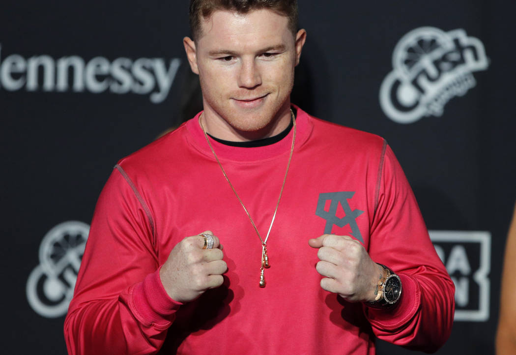 Canelo Alvarez poses for photographers during a ceremonial arrival for an upcoming boxing match ...