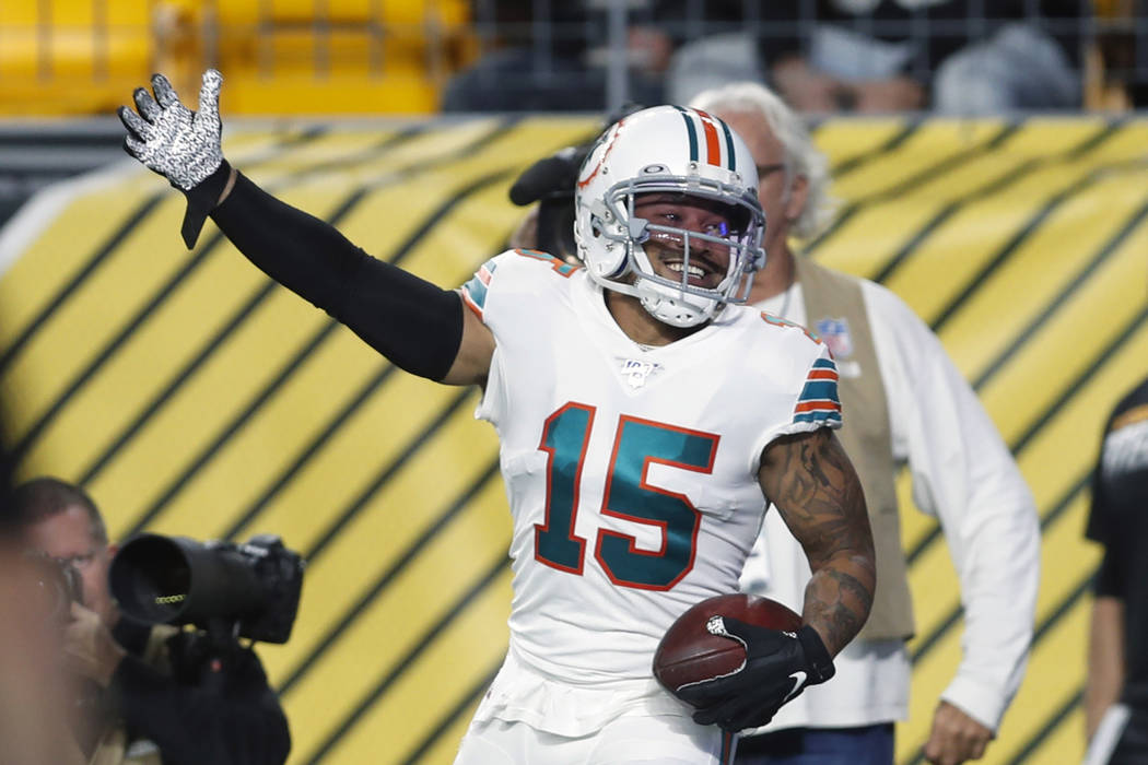 Miami Dolphins wide receiver Albert Wilson (15) celebrates his touchdown during the first half ...