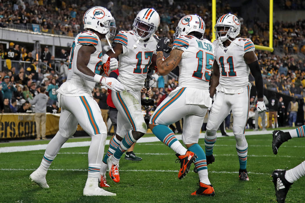 Miami Dolphins wide receiver Allen Hurns (17) celebrates his touchdown during the first half of ...