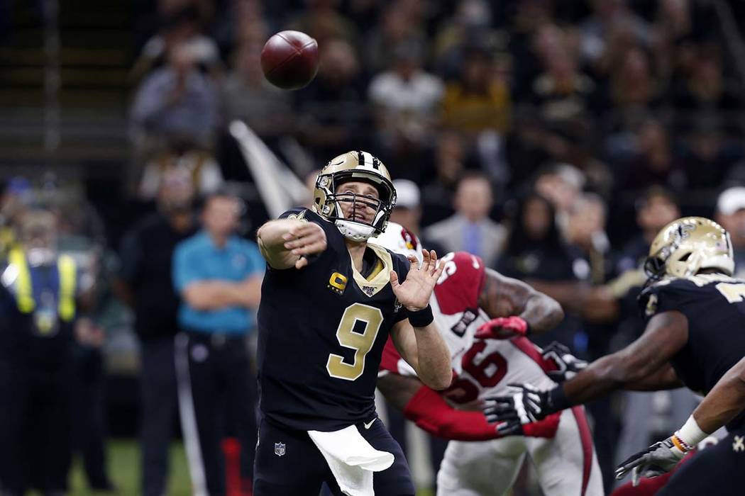 New Orleans Saints quarterback Drew Brees (9) passes in the first half of an NFL football game ...