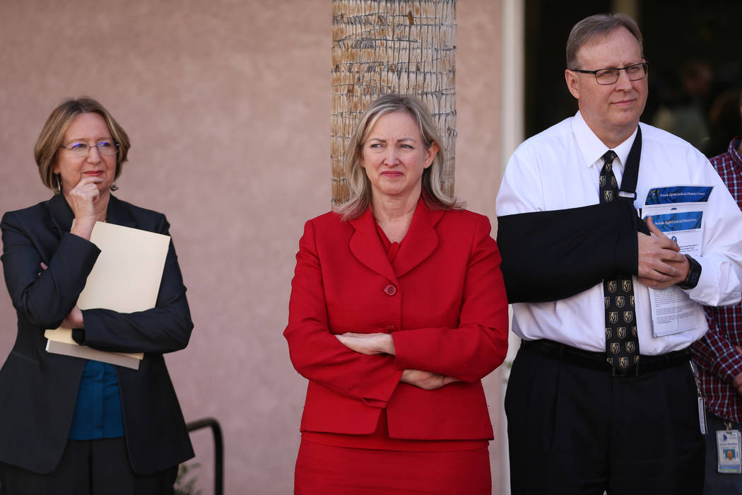 Executive Director of Legal Aid Center of Southern Nevada Barbara Buckley, from left, Chief Jud ...