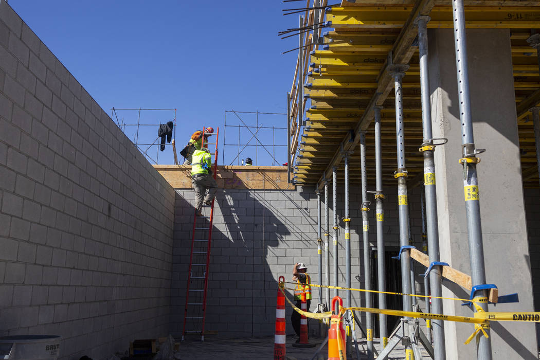 Construction occurs on shareDOWNTOWN located in the Arts District at the corner of Casino Cente ...