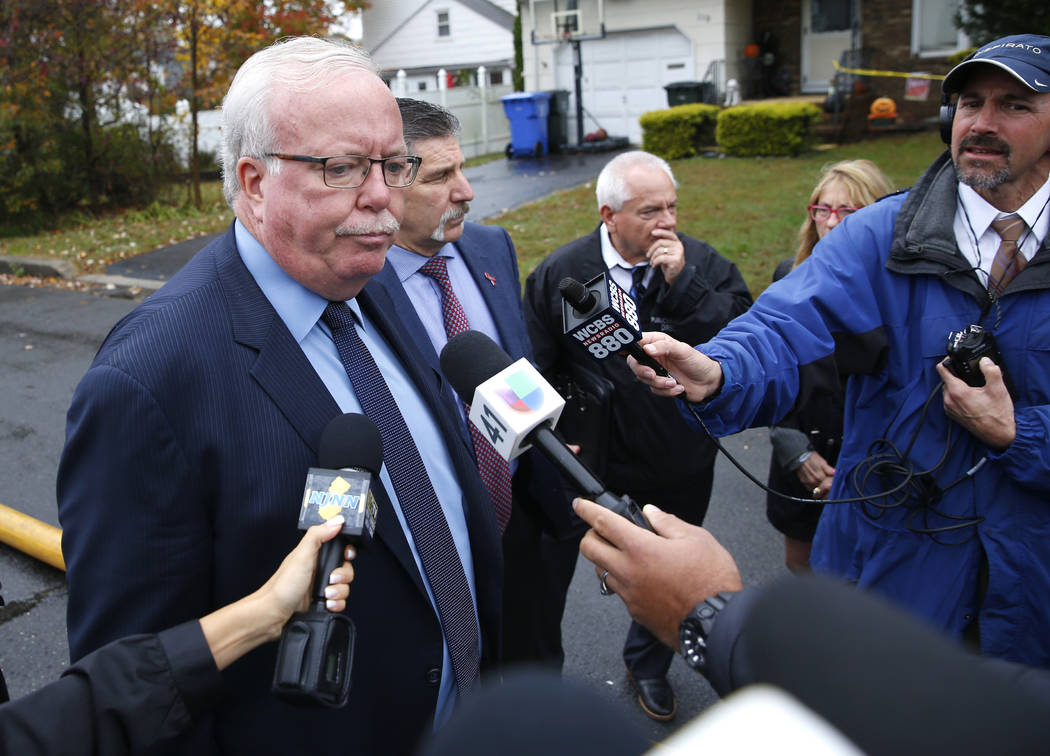 Woodbridge Mayor John McCormac answers questions from media about a Cessna 414 plane that crash ...