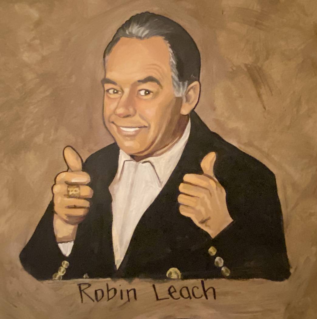 Robin Leach's image is shown on the wall of Palm Restaurant at the Forum Shops at Caesars. (Joh ...