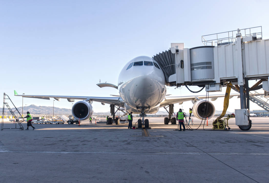 Airline workers inspect Level's first non-stop transatlantic service between Paris and Las Vega ...